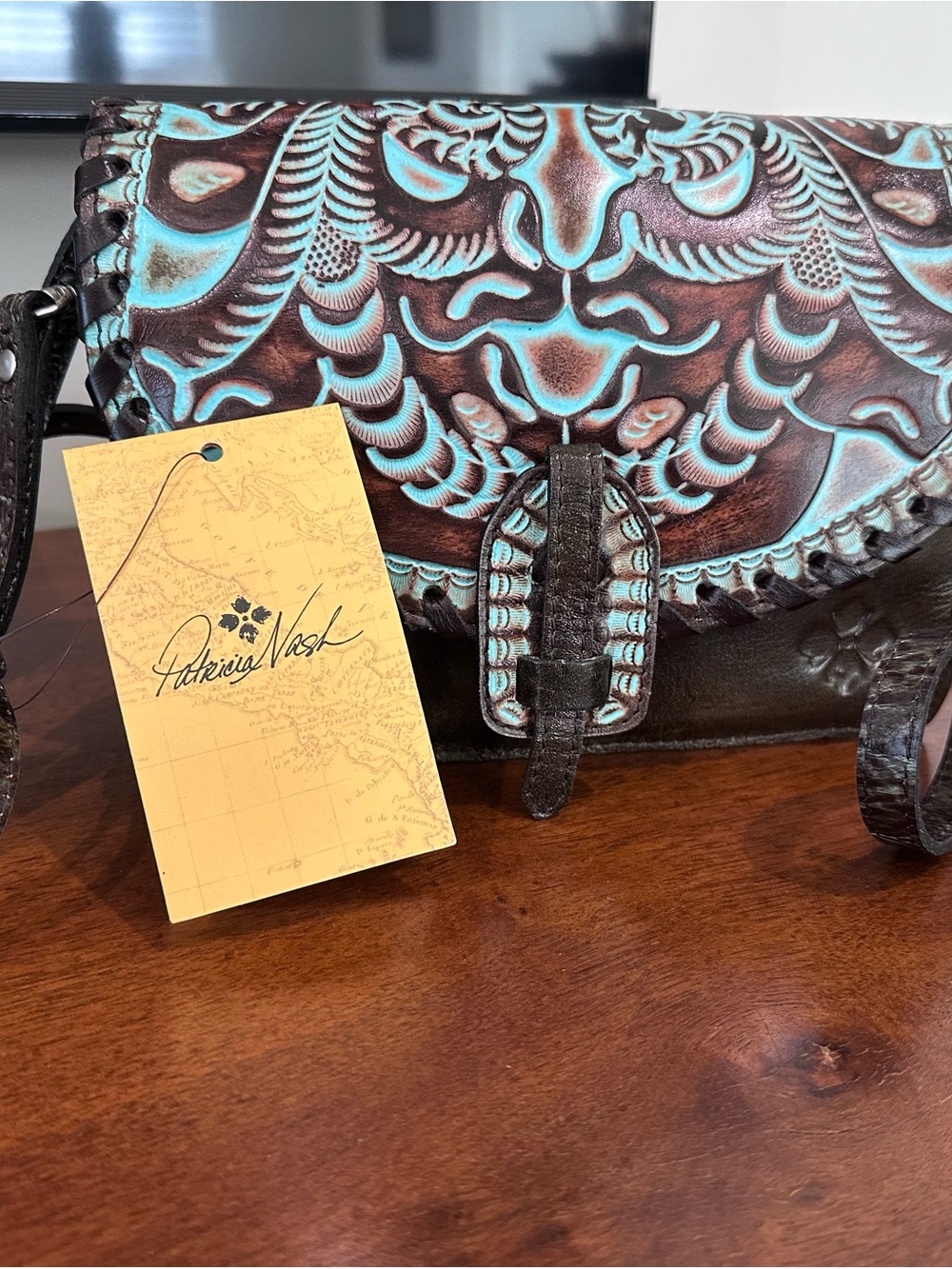Patricia Nash Tooled Turquoise Accent Leather Bag Tag